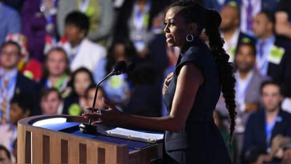 Harris will rally with Michelle Obama in Michigan as early voting begins