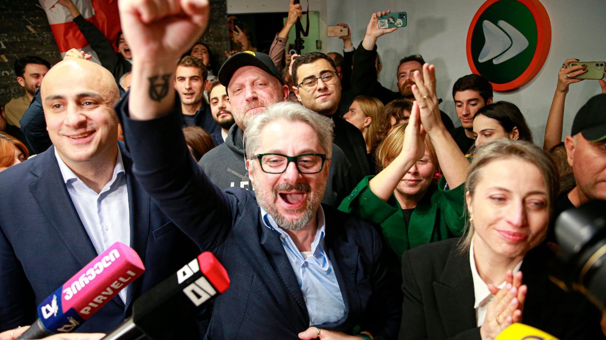 From left, Nika Melia, Nika Gvaramia, leaders of Coalition for Changes, and Nana Malashkhia, who leads the Coalition for Change parliament list, react while talking to journalists at coalition's headquarters after polls closing at the parliamentary election in Tbilisi, Georgia, Saturday, Oct. 26, 2024. Image- AP From left, Nika Melia, Nika Gvaramia, leaders of Coalition for Changes, and Nana Malashkhia, who leads the Coalition for Change parliament list, react while talking to journalists at coalition's headquarters after polls closing at the parliamentary election in Tbilisi, Georgia, Saturday, Oct. 26, 2024. Image- AP