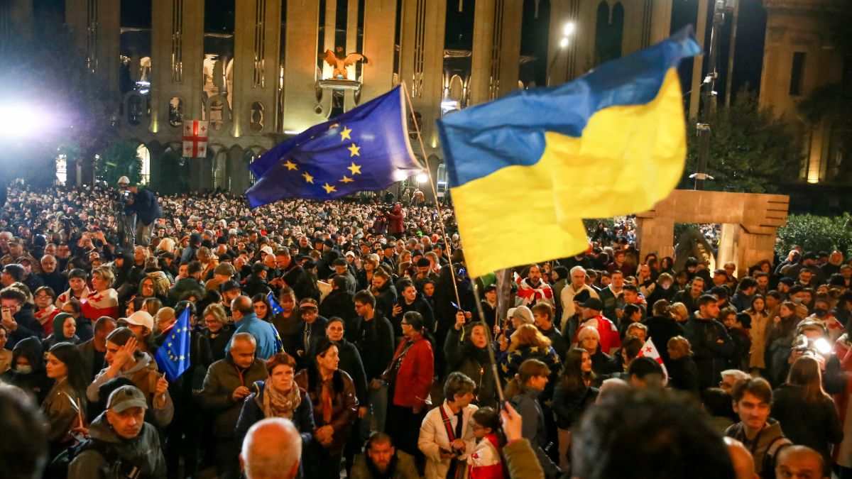 Demonstrators wave EU and Ukrainian national flags as they gather during an opposition protest against the results of the parliamentary election in Tbilisi, Georgia, Monday, Oct. 28, 2024. Image- AP Demonstrators wave EU and Ukrainian national flags as they gather during an opposition protest against the results of the parliamentary election in Tbilisi, Georgia, Monday, Oct. 28, 2024. Image- AP