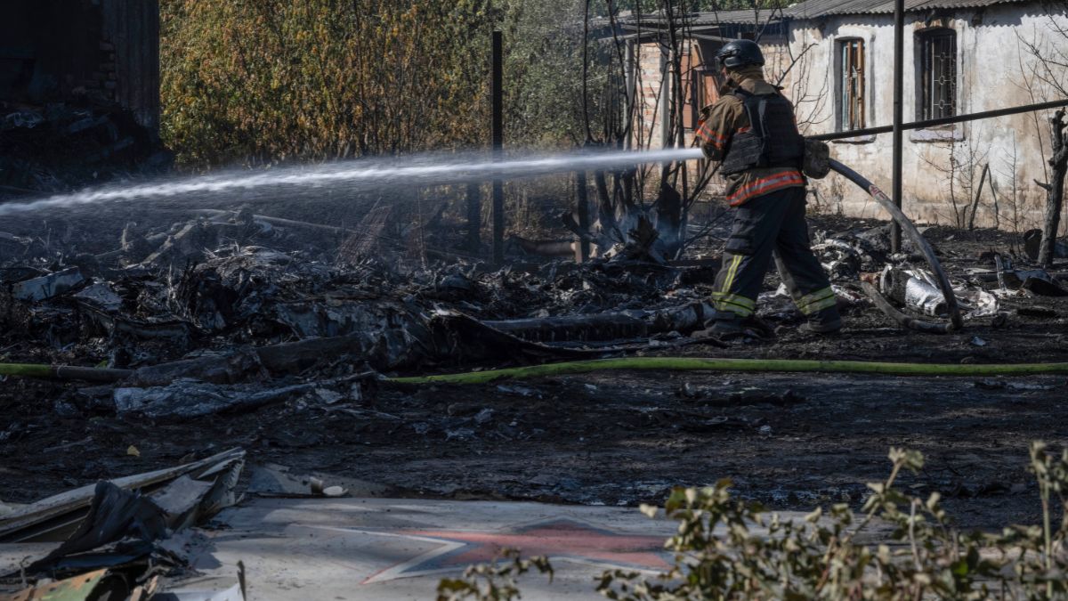 A firefighter puts out the fire after fragments of the downed Russian military plane damaged private houses, on the outskirts of Kostyantynivka, a near-front line city in the Donetsk region, Ukraine, Saturday, Oct. 5, 2024.- AP A firefighter puts out the fire after fragments of the downed Russian military plane damaged private houses, on the outskirts of Kostyantynivka, a near-front line city in the Donetsk region, Ukraine, Saturday, Oct. 5, 2024.- AP