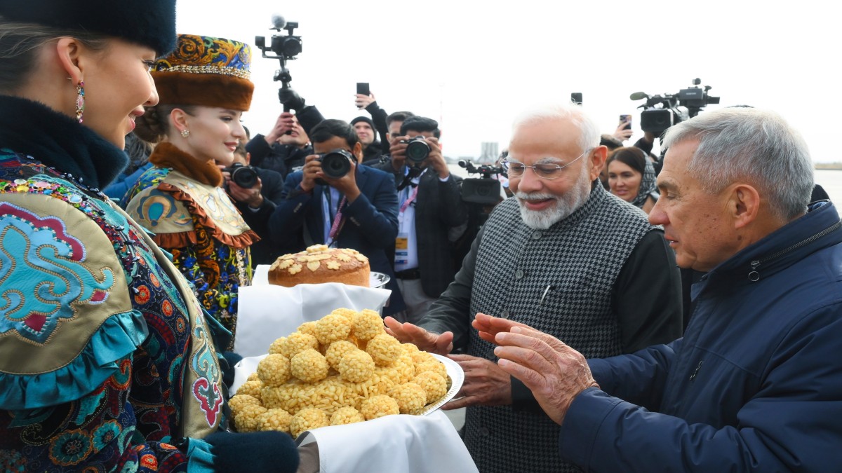 Indian Prime Minister Narendra Modi, second right, tries Tatar traditional sweet Chak-chak upon his arrival at Kazan International Airport for the BRICS Summit in Kazan, Russia, Tuesday, October 22, 2024. AP Indian Prime Minister Narendra Modi, second right, tries Tatar traditional sweet Chak-chak upon his arrival at Kazan International Airport for the BRICS Summit in Kazan, Russia, Tuesday, October 22, 2024. AP