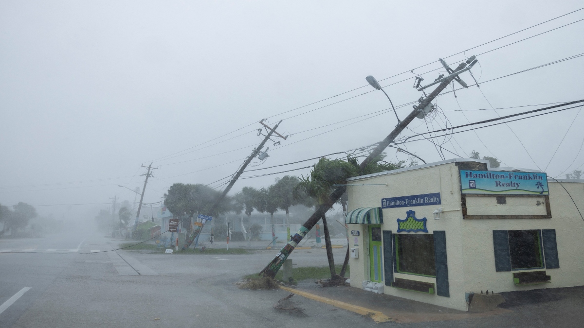 Broken utility poles downed by strong wind gusts are seen as Hurricane Milton approaches Fort Myers, Florida, US. on October 9, 2024. Reuters Broken utility poles downed by strong wind gusts are seen as Hurricane Milton approaches Fort Myers, Florida, US. on October 9, 2024. Reuters