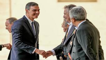 Spain's Prime Minister Pedro Sanchez arrives in the St. Damasus courtyard at the Vatican on his way to a private meeting with Pope Francis, on Friday. AP 
