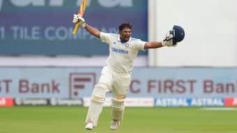 Sarfaraz Khan celebrates after completing his maiden international hundred on Day 4 of the first Test between India and New Zealand at the M Chinnaswamy Stadium in Bengaluru. AP