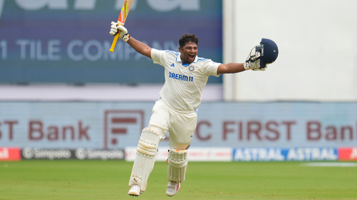 Sarfaraz Khan celebrates after completing his maiden international hundred on Day 4 of the first Test between India and New Zealand at the M Chinnaswamy Stadium in Bengaluru. AP Sarfaraz Khan celebrates after completing his maiden international hundred on Day 4 of the first Test between India and New Zealand at the M Chinnaswamy Stadium in Bengaluru. AP