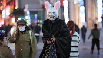 A person walks down the street during Halloween celebrations in Shenyang, in China's northeastern Liaoning province, October 31, 2023. Source: AFP | FILE.
