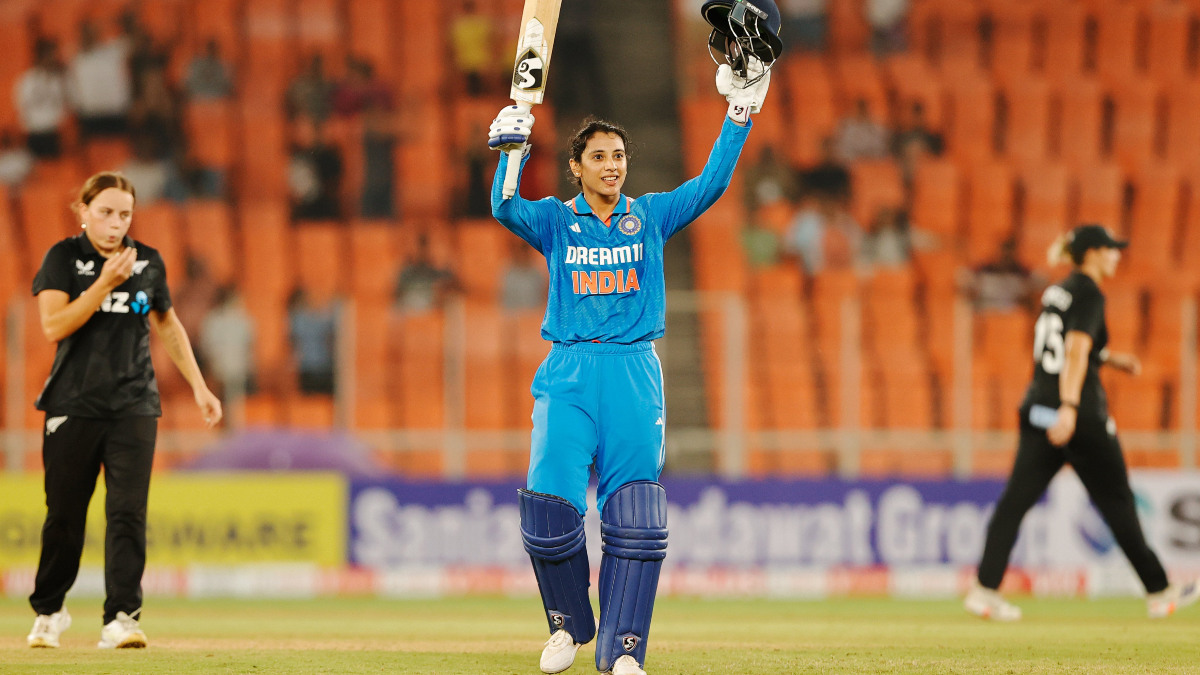 India opener Smriti Mandhana raises her bat in celebration after completing her century during the third ODI against New Zealand in Ahmedabad. PTI India opener Smriti Mandhana raises her bat in celebration after completing her century during the third ODI against New Zealand in Ahmedabad. PTI