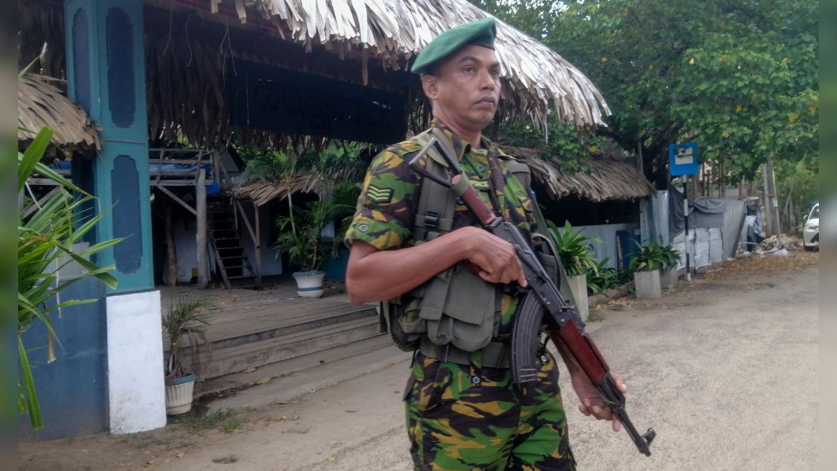 A police commando stands guard in front of a restaurant in Arugam Bay, Sri Lanka, October 23, 2024. File Image/AP A police commando stands guard in front of a restaurant in Arugam Bay, Sri Lanka, October 23, 2024. File Image/AP