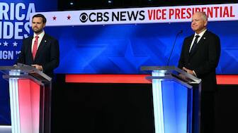US Senator and Republican vice presidential candidate JD Vance (L) and Minnesota Governor and Democratic vice presidential candidate Tim Walz participate in the Vice Presidential debate hosted by CBS News at the CBS Broadcast Center in New York City on October 1, 2024. Source: AFP. 
