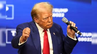 Republican presidential nominee former US President Donald Trump dances during a town hall campaign event in Oaks, Pennsylvania, US, October 14, 2024. Reuters