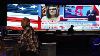 A man watching the presidential elections of 2020 in West Hollywood, California. File image/AP 