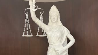 The Supreme Court of India has unveiled a redesigned statue of Lady Justice in its library. The new figurine has undergone a couple of symbolic changes, including the removal of her blindfold. Image courtesy: X/@BimalGST