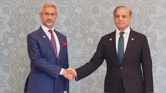 External Affairs Minister S Jaishankar shakes hands with Pakistan PM Shehbaz Sharif at the SCO meet, in Islamabad, on October 16, 2024. Image courtesy: X/@DrSJaishankar

