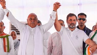 Congress leader Rahul Gandhi with former Haryana CM Bhupinder Singh Hooda during the party's Haryana Vijay Sankalp Jansabha, ahead of Assembly polls, in Nuh, Haryana, October 3, 2024. File Photo/PTI