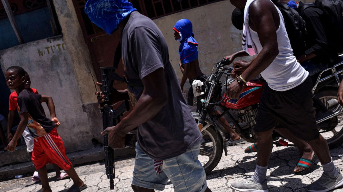 Food for arms: Rights group finds Haitian gangs luring starving kids, up to 30% recruits are children Food for arms: Rights group finds Haitian gangs luring starving kids, up to 30% recruits are children