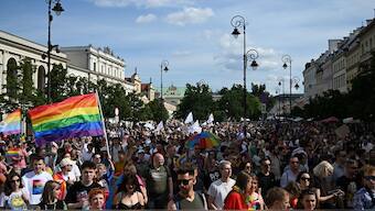 Participants parade through the streets during the Warsaw Pride Parade in Warsaw, Poland on June 15, 2024. AFP