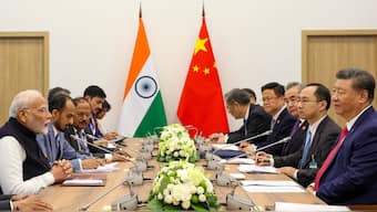 Chinese President Xi Jinping, right, at a meeting with Prime Minister Narendra Modi, left, on the sidelines of the BRICS Summit in Kazan, Russia, October 23, 2024. AP
