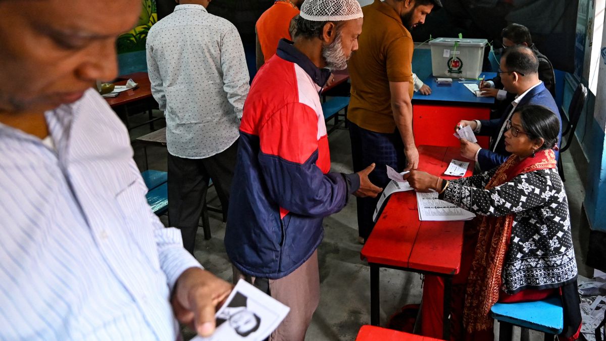 People check their names in the electoral rolls to cast their votes at a polling station during Bangladesh's general elections in Dhaka on January 7, 2024. AFP file/Representational image People check their names in the electoral rolls to cast their votes at a polling station during Bangladesh's general elections in Dhaka on January 7, 2024. AFP file/Representational image