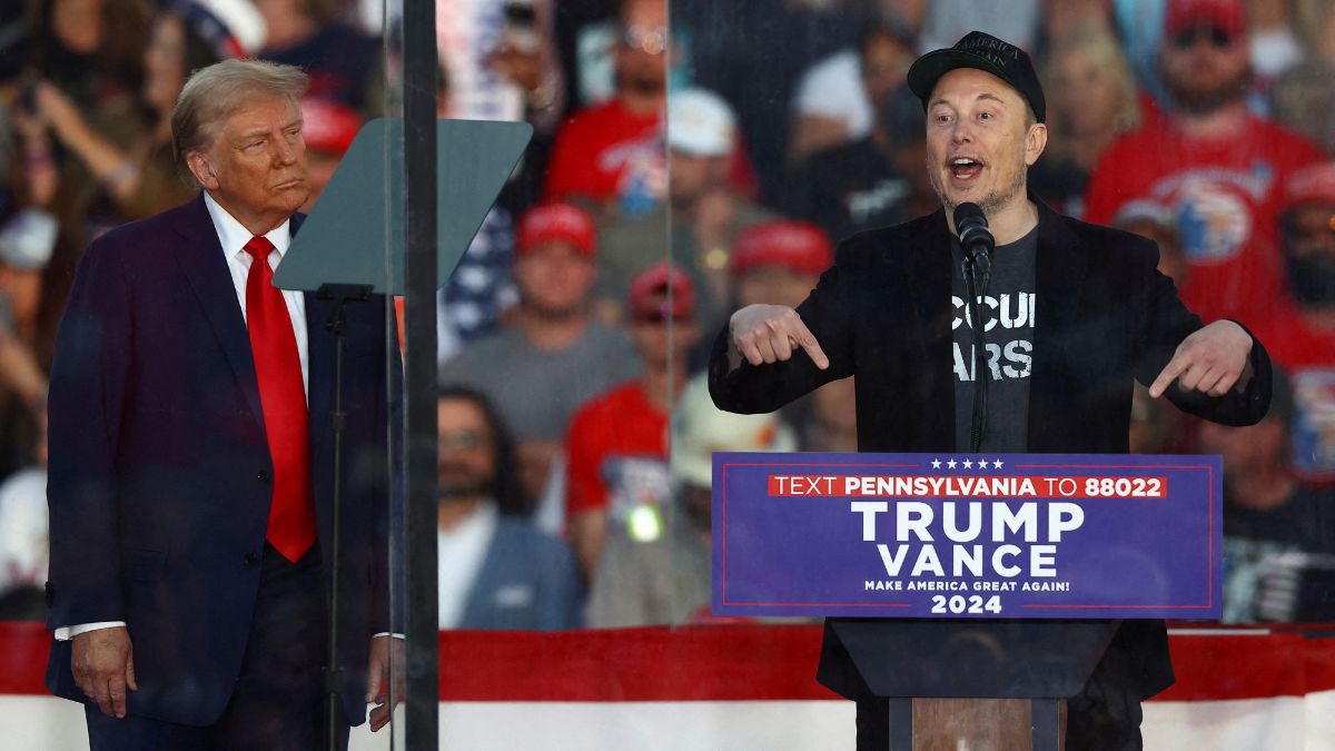 Elon Musk speaks as Republican presidential nominee Donald Trump looks on during a rally at the site of the July assassination attempt against Trump, in Pennsylvania, US, October 5, 2024. Reuters Elon Musk speaks as Republican presidential nominee Donald Trump looks on during a rally at the site of the July assassination attempt against Trump, in Pennsylvania, US, October 5, 2024. Reuters