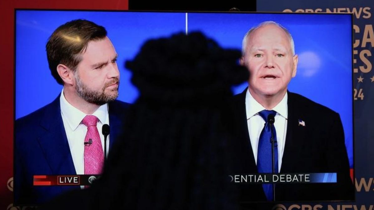 Viewers in the spin room watch the CBS News vice presidential debate between JD Vance and Tim Walz, on Tuesday, October 1, 2024, in New York, US. Source: AP. Viewers in the spin room watch the CBS News vice presidential debate between JD Vance and Tim Walz, on Tuesday, October 1, 2024, in New York, US. Source: AP.