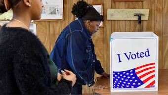 A woman casts her ballot on the day of the South Carolina Presidential Primary in Union, South Carolina, US, February 29, 2020. Reuters
