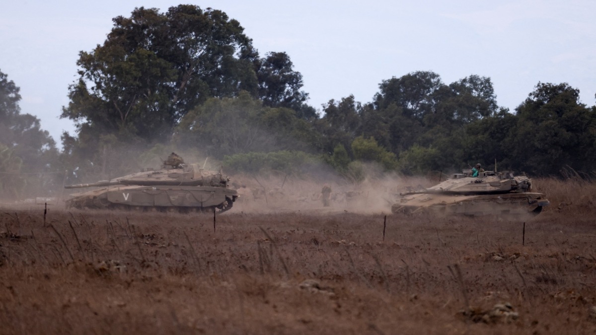 Israeli tanks are being moved, amid cross-border hostilities between Hezbollah and Israel, in the Israeli-occupied Golan Heights on September 22, 2024. Reuters File Israeli tanks are being moved, amid cross-border hostilities between Hezbollah and Israel, in the Israeli-occupied Golan Heights on September 22, 2024. Reuters File