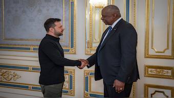 US Secretary of Defence Lloyd Austin, right, and Ukraine's President Volodymyr Zelenskyy shake hands during their meeting in Kyiv, Ukraine, on Monday. AP
