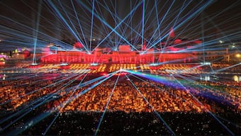 A laser show lights up the skies at a ghat on the banks of the Saryu River during ‘Deepotsav 2024’ on the eve of the 'Diwali' festival, in Ayodhya. PTI