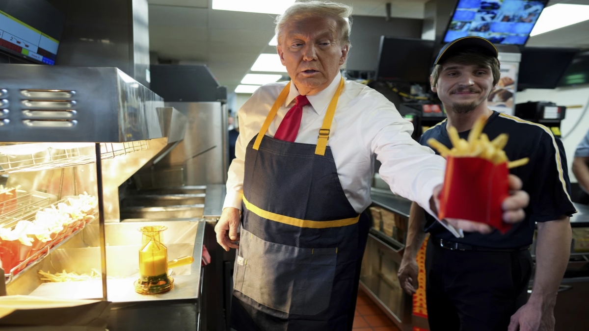 Republican presidential nominee former President Donald Trump, left, hands off an order of fries after working alongside an employee during a visit to McDonald’s in Feasterville-Trevose, Pa., Sunday, Oct. 20, 2024. AP Republican presidential nominee former President Donald Trump, left, hands off an order of fries after working alongside an employee during a visit to McDonald’s in Feasterville-Trevose, Pa., Sunday, Oct. 20, 2024. AP