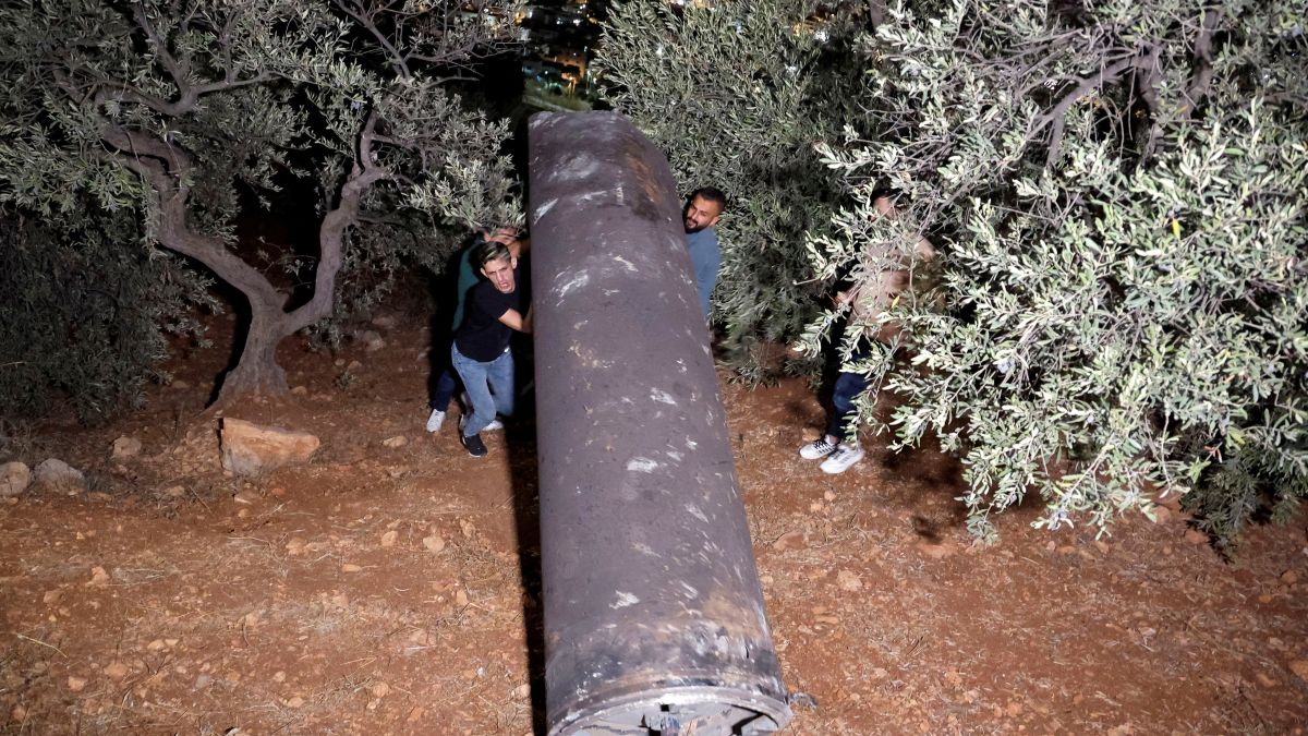Palestinians investigate a projectile, after Iran fired a salvo of ballistic missiles, in Tubas, in West Bank, October 1. The Islamic Republic launched 180 missiles at Israel in response to the killing of Hezbollah chief Hassan Nasrallah and others. Reuters Palestinians investigate a projectile, after Iran fired a salvo of ballistic missiles, in Tubas, in West Bank, October 1. The Islamic Republic launched 180 missiles at Israel in response to the killing of Hezbollah chief Hassan Nasrallah and others. Reuters