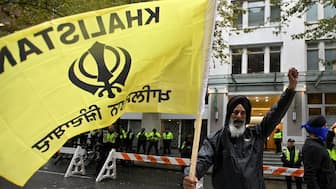 A supporter waves a Khalistan flag during a protest outside India's consulate after Canada's Prime Minister Justin Trudeau raised the prospect of New Delhi's involvement in the murder of  Hardeep Singh Nijjar, in Vancouver, British Columbia. File photo/Reuters