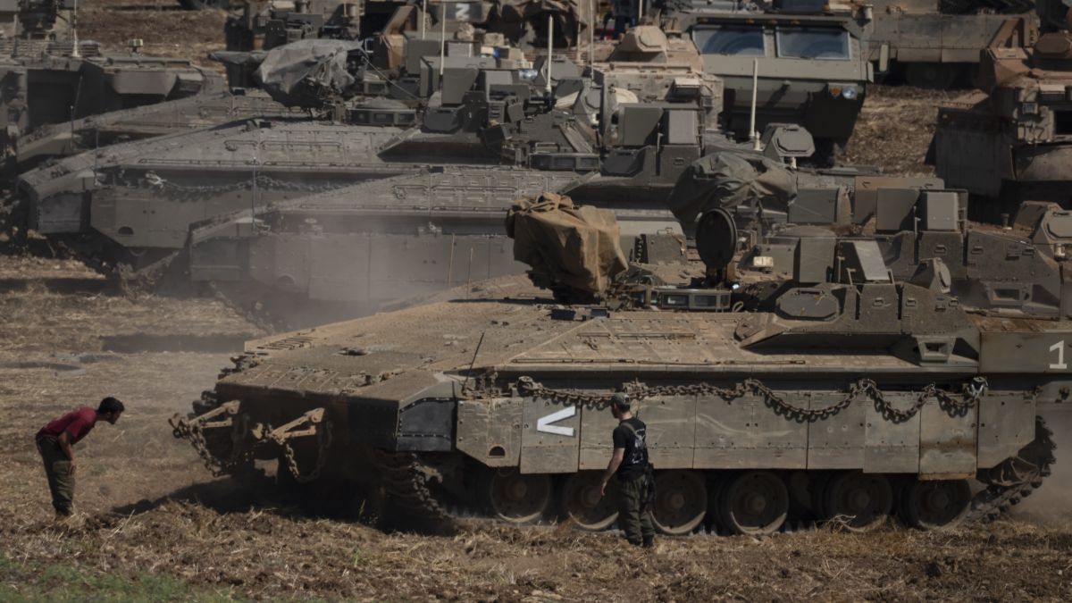 Israeli soldiers work on on an armoured personnel carrier (APC) at the Lebanon border. On Wednesday, Israel suffered a blow when eight of its soldiers died during the ongoing ground offensive against Hezbollah in Lebanon. AP Israeli soldiers work on on an armoured personnel carrier (APC) at the Lebanon border. On Wednesday, Israel suffered a blow when eight of its soldiers died during the ongoing ground offensive against Hezbollah in Lebanon. AP