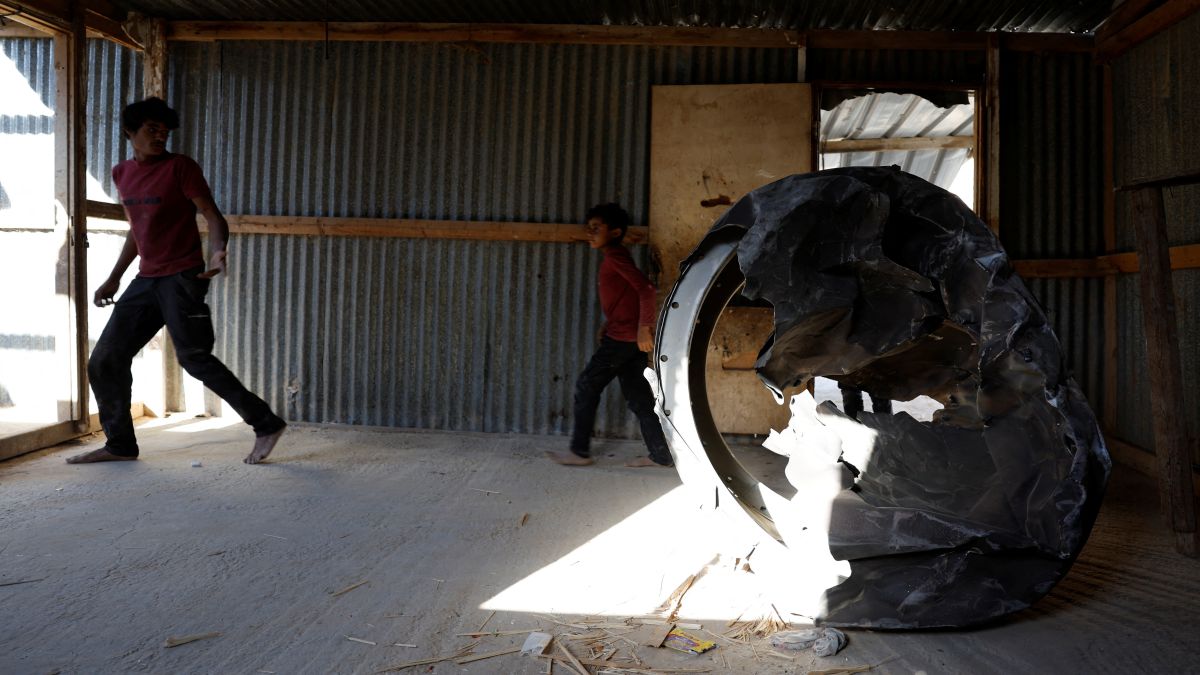 People walk next to a fragment of apparent remains of a ballistic missile which fell at an unrecognised Bedouin village, following an attack by Iran on Israel, near the southern city of Arad, Israel. Since then, oil prices have been rising. Reuters People walk next to a fragment of apparent remains of a ballistic missile which fell at an unrecognised Bedouin village, following an attack by Iran on Israel, near the southern city of Arad, Israel. Since then, oil prices have been rising. Reuters
