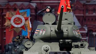 A Russian service member is seen atop a T-34 Soviet-era tank that drives along Red Square during a rehearsal for a military parade. Russia is to increase its spending on defence by 25 per cent to its highest on record. Representational image/Reuters