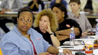 Poll watchers are ordinary citizens who volunteer to observe elections on behalf of an organization. Reuters