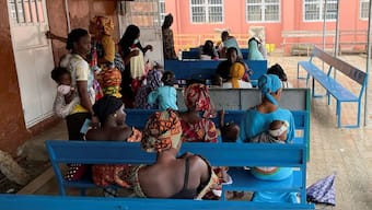 Mothers wait with their children while Health workers prepare routine vaccines for young children at Bundung Maternal and Child Health Hospital in Bundung, Gambia August 30, 2022. Reuters