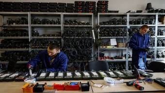 Employees work at a production facility of Unwave company, a Ukrainian producer of jammers and radio electronic warfare, amid Russia's attack on Ukraine, at an undisclosed location, Ukraine October 28, 2024. Reuters