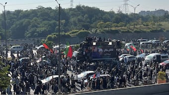 Supporters of the former Pakistani prime minister Imran Khan's party Pakistan Tehreek-e-Insaf (PTI) attend a rally demanding release of Khan, in Islamabad. Reuters