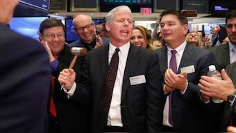 Chris Wright rings a ceremonial bell to celebrate his company’s IPO on the floor of the New York Stock Exchange, on 12 January 2018. File Image/ Reuters 