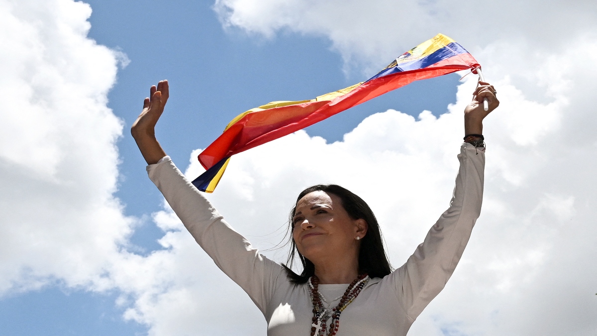 Venezuelan opposition leader Maria Corina Machado waves a Venezuelan flag during a rally in Caracas on August 28, 2024. File Image / AFP Venezuelan opposition leader Maria Corina Machado waves a Venezuelan flag during a rally in Caracas on August 28, 2024. File Image / AFP