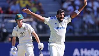 Jasprit Bumrah picked up four of Australia's seven wickets on Day 1 of the first Test in Perth. AP 