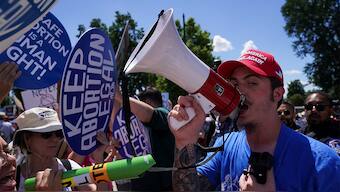(File) An anti-abortion protester uses a megaphone outside the US Supreme Court as abortion rights activists gather to mark the second anniversary of the Court overturning Roe vs Wade, in Washington, US, on June 24, 2024. Reuters