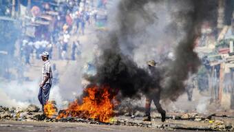 A barricade burns in Mozambique's capital Maputo. AP