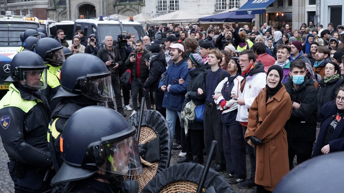 Pro-Palestinian protesters face Dutch police during a banned demonstration in Amsterdam, Netherlands. Image: Reuters Pro-Palestinian protesters face Dutch police during a banned demonstration in Amsterdam, Netherlands. Image: Reuters