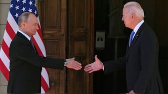 (File) Russian President Vladimir Putin, left, and US President Joe Biden shake hands at a meeting in Geneva, Switzerland, on June 16, 2021. AP