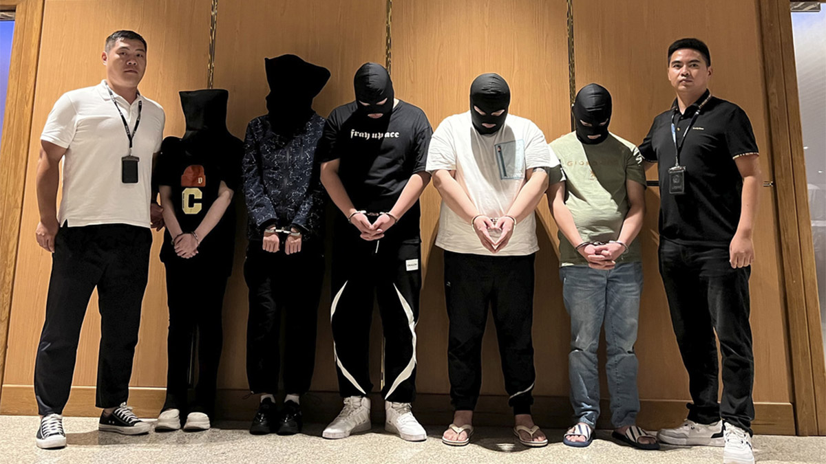 (File) Myanmar police hand over five telecom and internet fraud suspects to Chinese police at Yangon International Airport in Yangon, Myanmar on August 26, 2023. AP (File) Myanmar police hand over five telecom and internet fraud suspects to Chinese police at Yangon International Airport in Yangon, Myanmar on August 26, 2023. AP