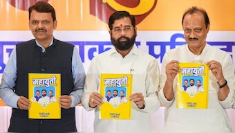 Maharashtra Chief Minister Eknath Shinde along with Deputy Chief Ministers Devendra Fadnavis (L) and Ajit Pawar (R). Source: PTI.
