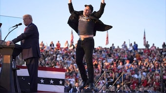 Billionaire Elon Musk jumps around on stage in support of Donald Trump at one of his election campaign rallies. Source: AP.