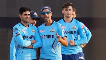 Gujarat Titans captain Shubman Gill and coach Ashish Nehra have a lot of work to do after IPL retentions. Image: PTI
