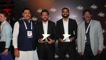 Harmanpreet Singh and PR Sreejesh pose with their respective awards at the FIH Hockey Stars Awards in Muscat, Oman. Image credit: X/@TheHockeyIndia